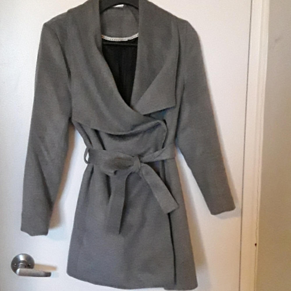 Very good condition  grey coat